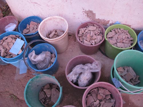Pottery sherds in buckets, at Pella, Jordan (2011 season)