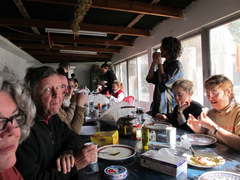 The team enjoys breakfast at Pella in Jordan, 2011
