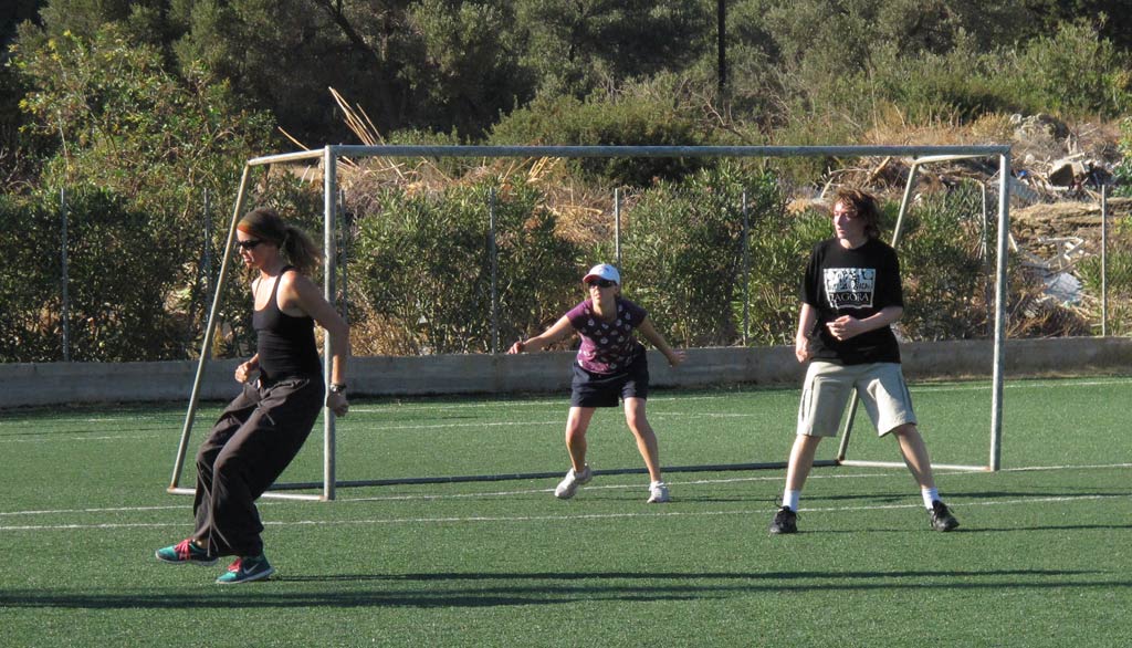 Kristen Mann, Kate Boyd and Matthew Csapo-Miller defending the goal