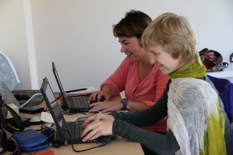 Petra Janouchova and Adela Sobotkova working in the Zagora office at Batsi