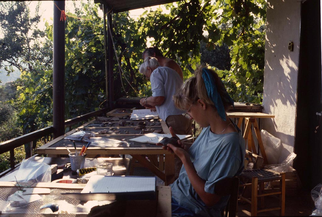Beatrice McLoughlin in the foreground with Olwyn Tudor-Jones behind her; in the potshed at Torone in 1986