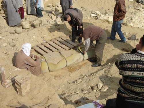 One of the excavated Late Period (664-525 BCE) coffins ready to be moved to a secure storehouse