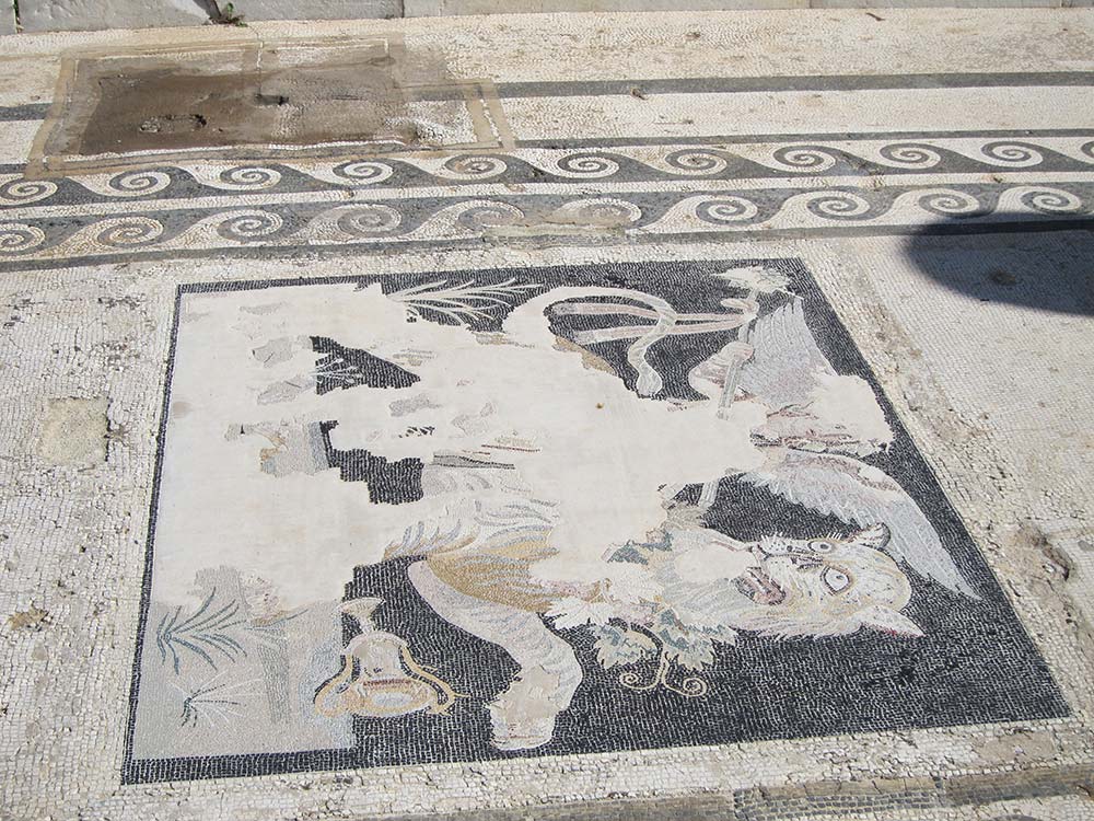 Mosaic floor depicting the god Dionysis mounted on a tiger