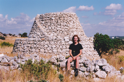 Resting on a trullo wall after a hard day’s survey. Apulia 2001