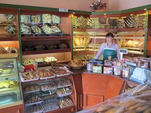 Woman waiting to serve customers at the Tountas Bakery