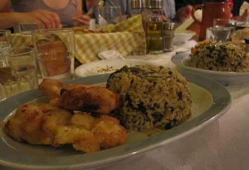 Crispy coated fish and risotto