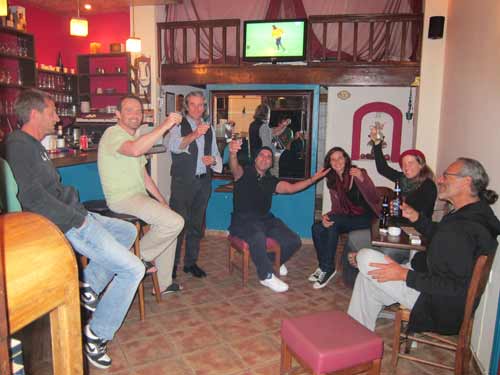 Enjoying watching the soccer and each other's company in the Kantouni's cosy bar