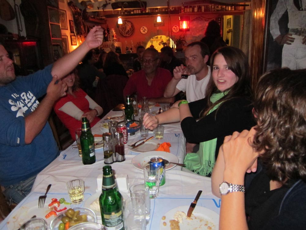Zagora 2012 team members comparing arm injuries/scars over dinner.... 