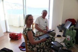 Beatrice McLoughlin and Andrew Wilson in the Zagora office in Batsi during the 2013 season.