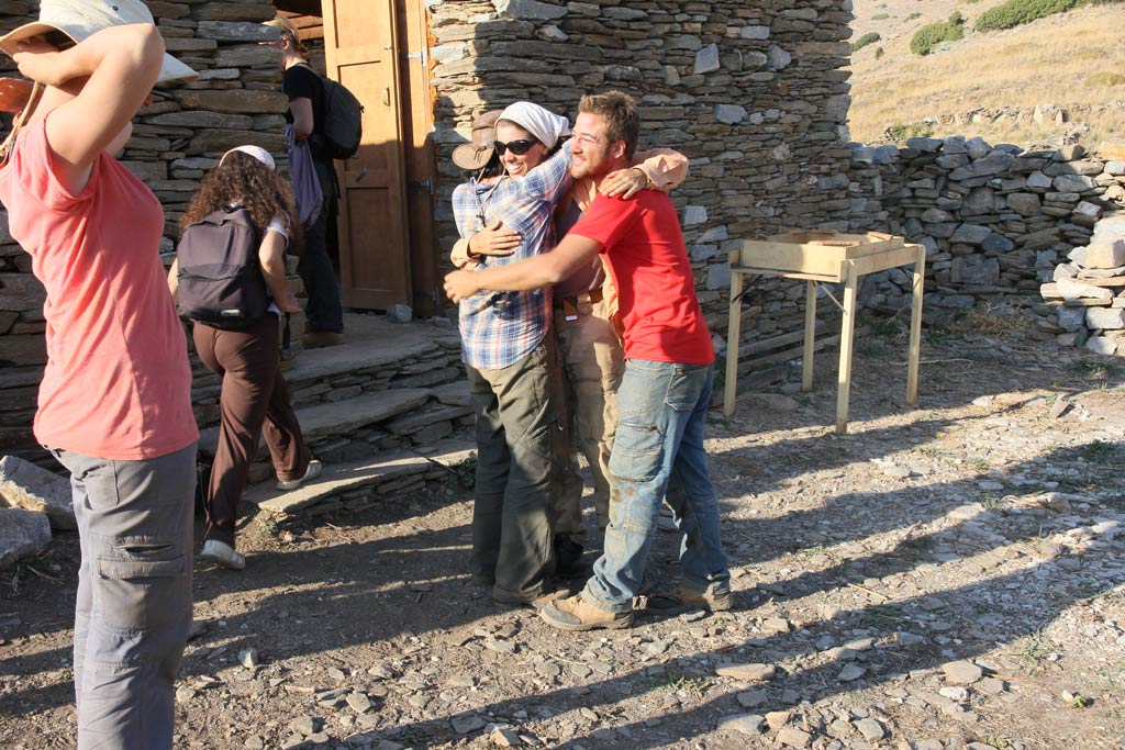 Antonio Bianco hugging trench team mates Kristen Mann and Elaine Lin