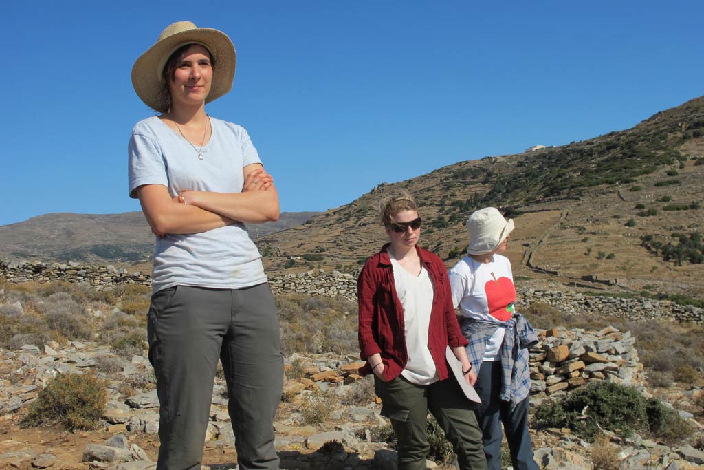 Hannah Morris, Julia Manouras and Kate McAllan standing near Excavation area 5 at the southern end of Zagora