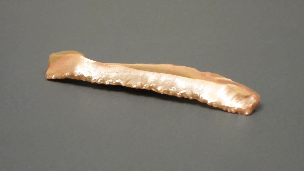 Stone blade, c. 4000BCE, excavated from Teleilat Ghassul, on the shore of the Dead Sea in modern Jordan