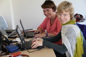 Petra Janouchova and Adela Sobotkova working in the Zagora office at Batsi