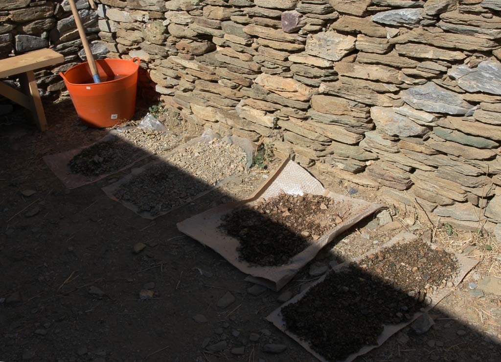Soil samples drying in the courtyard of the Zagora dig hut. 