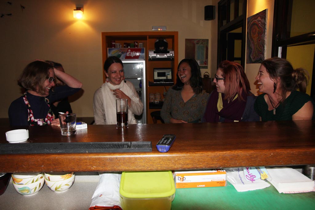 From left: Beatrice McLoughlin, Evi Margaritis, Elaine Lin, Tessa Morgan and Kristen Mann enjoy a laugh together while unwinding at the Kantouni bar on a Saturday night. 