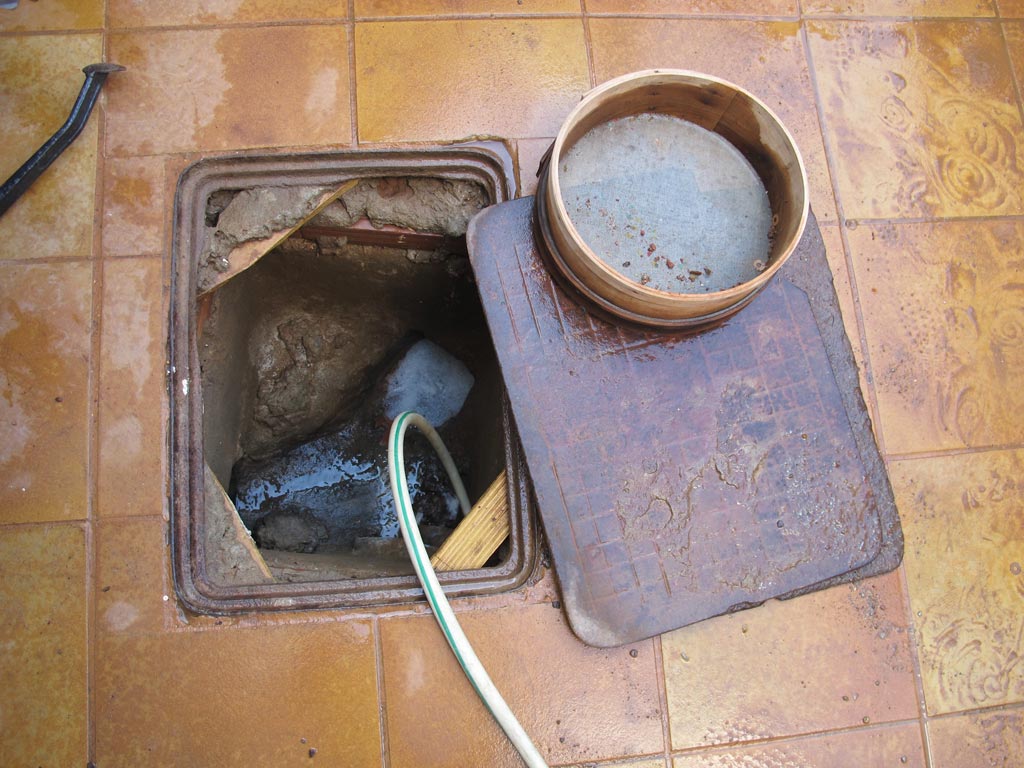 The drain at the rear of Andros Museum