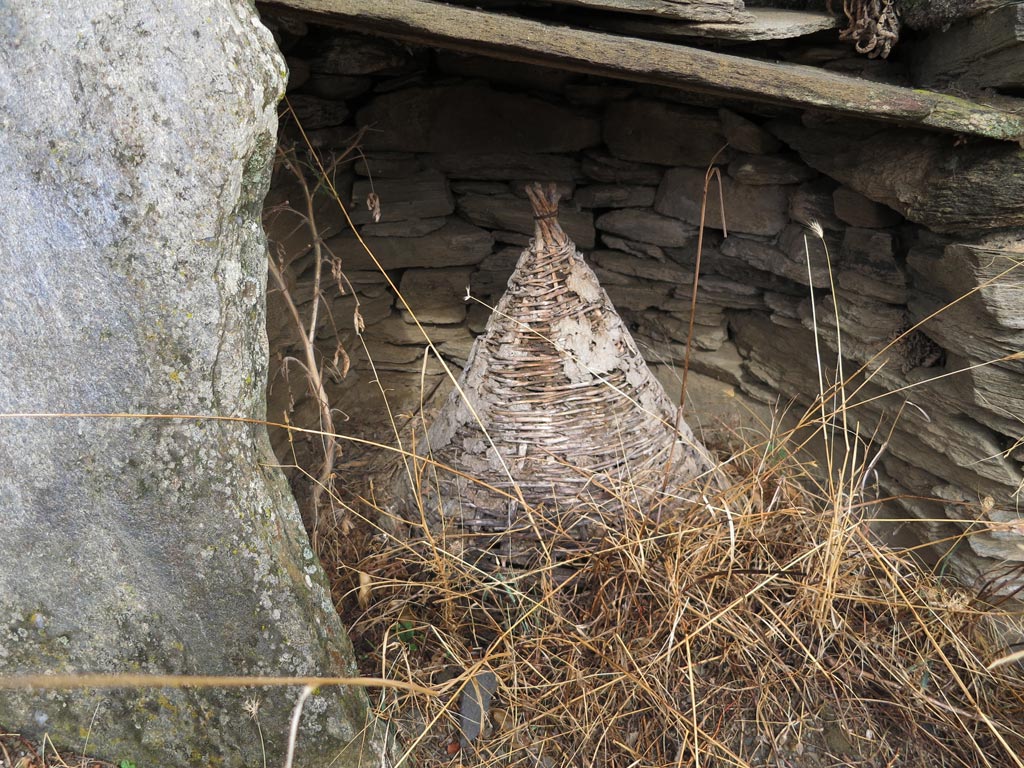A closer view of one of the conical beehives