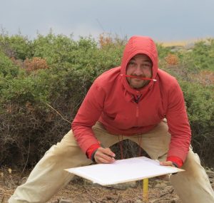 Antonio Bianco working on the plan of his trench