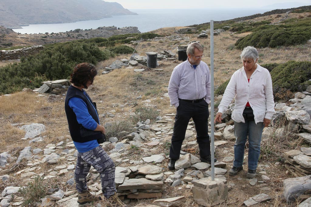 Lesley Beaumont, Jim Coulton and Meg Miller considering the poles which will become fenceposts to protect the temple remains at Zagora