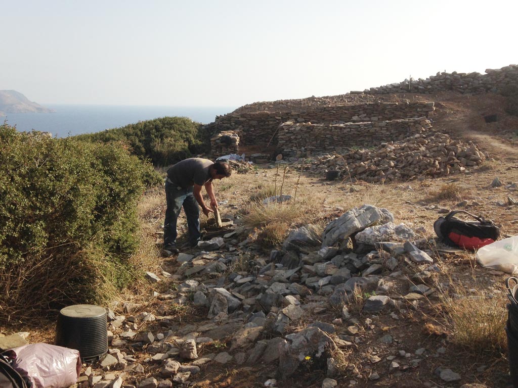 Giorgos Moustakas from Batsi selecting stones for the backfilling
